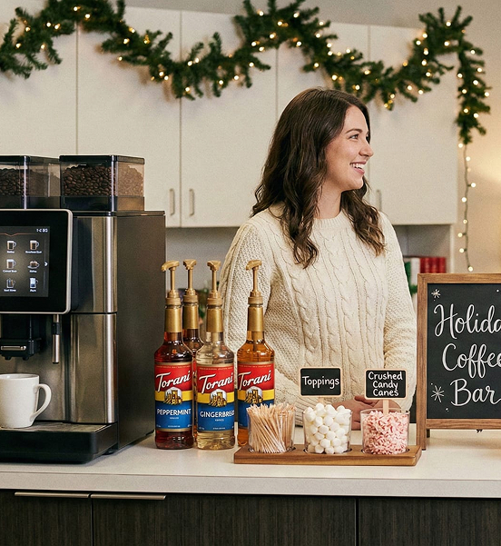 woman holding coffee cup